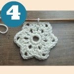 A beginner crochet pattern for a crocheted flower.