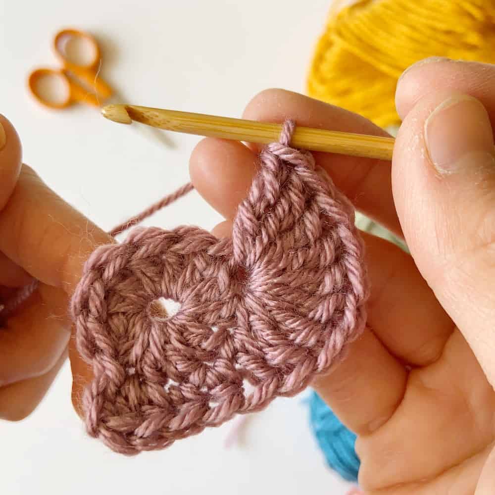 How to crochet a heart, simple and easy crochet step by step photo tutorial to crochet a heart. The heart appeal, I hold your heart in my hand. 