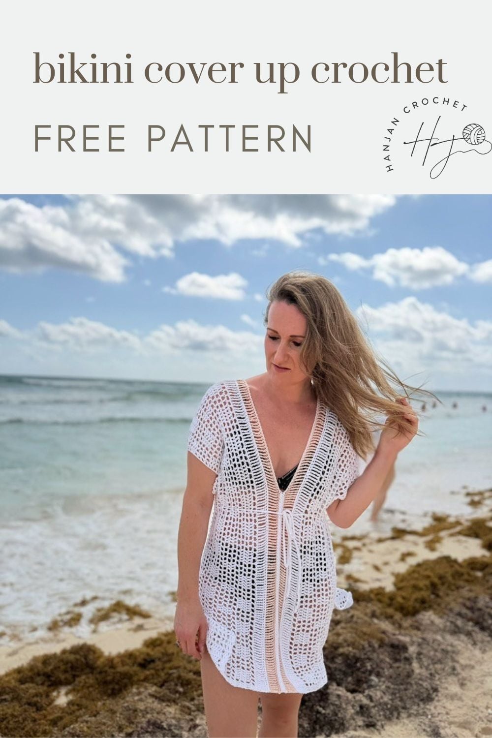 Woman wearing a white bikini cover up crochet pattern stands on a beach near the ocean; text reads "bikini cover up crochet FREE PATTERN.