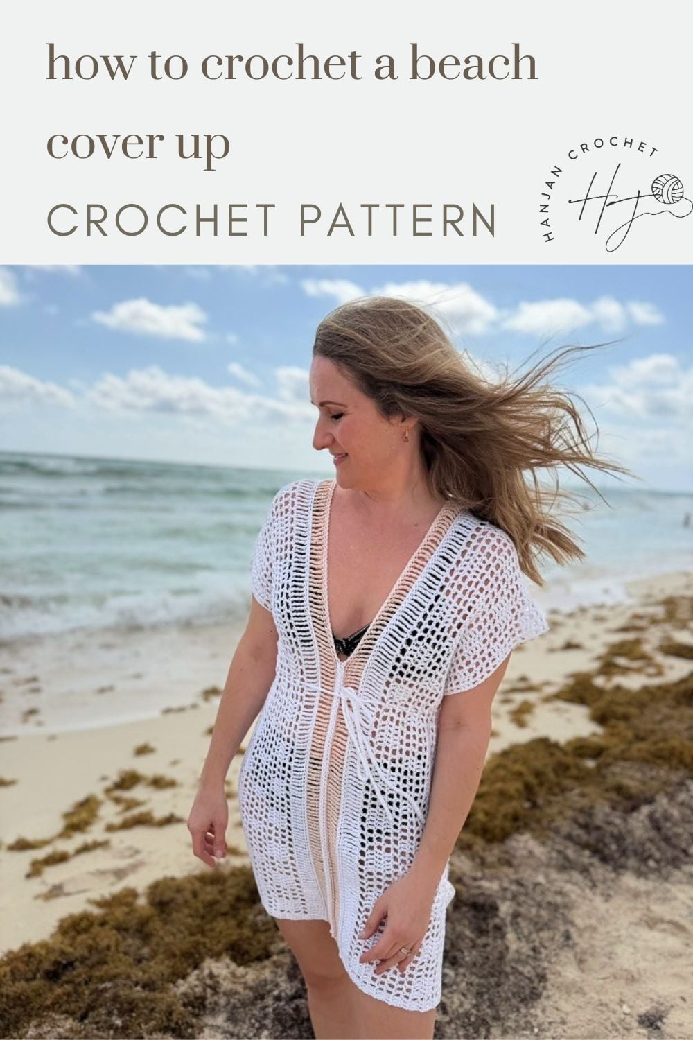 Woman wearing a white crochet beach cover-up stands on a sandy beach with seaweed, ocean, and cloudy sky in the background. Text above reads "how to crochet a bikini cover up CROCHET PATTERN.