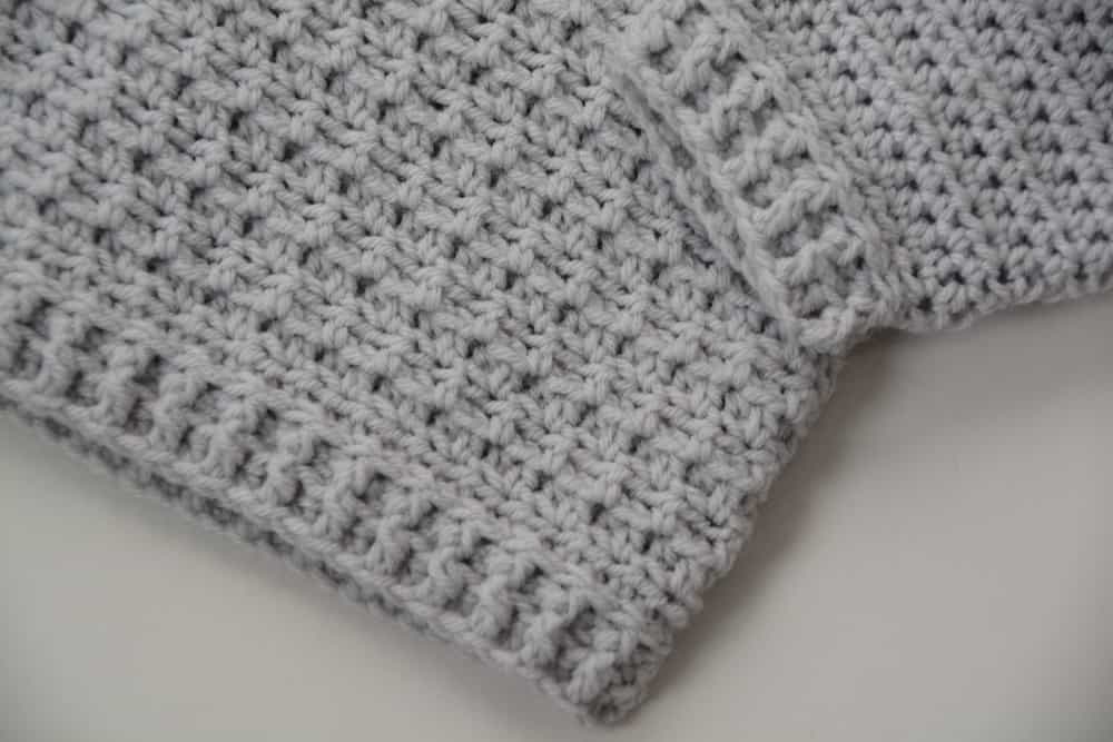 modern baby crochet jumper cuff and sleeve detail