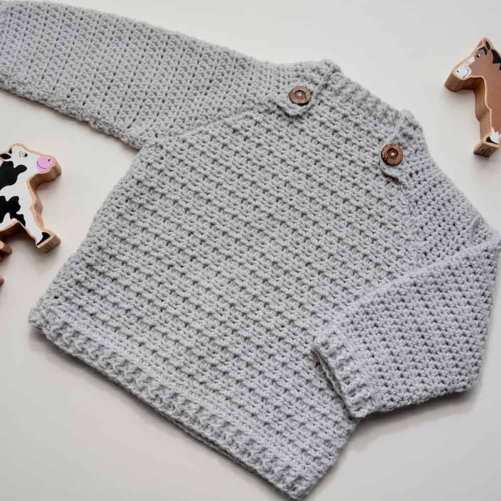 modern baby crochet sweater in grey