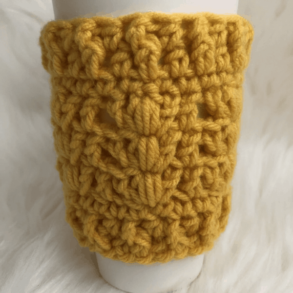 mustard yellow crochet coffee cup sleeve