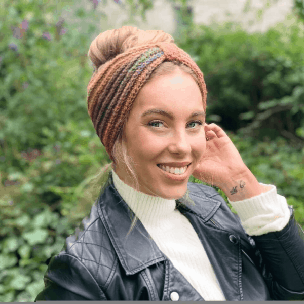 blonde woman in leather jacket wearing crochet turban headband