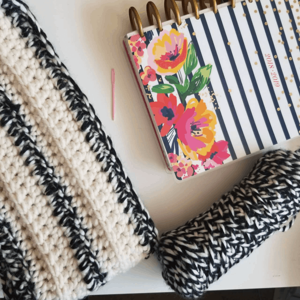 black and white headband with notebook