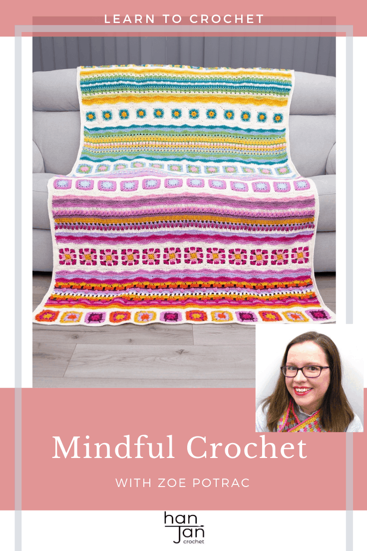 mindfulness crochet blanket on grey sofa in bright and cheery colours