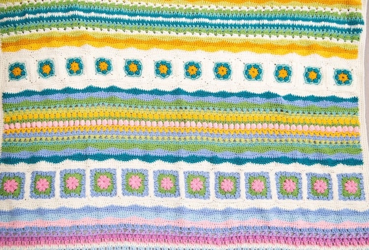 crochet blanket close up using granny squares and crochet wave stitch 