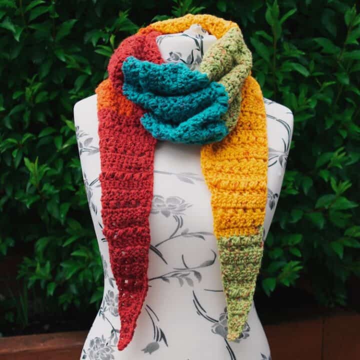 colourful crochet scarf on mannequin