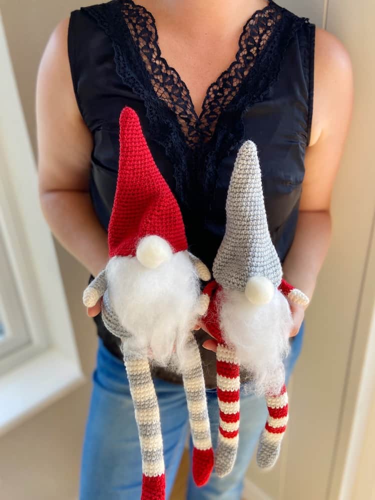 Pair of Christmas crochet gnomes in traditional Scandinavian Christmas colours.