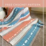 modern crochet blanket for babies draped over a basket
