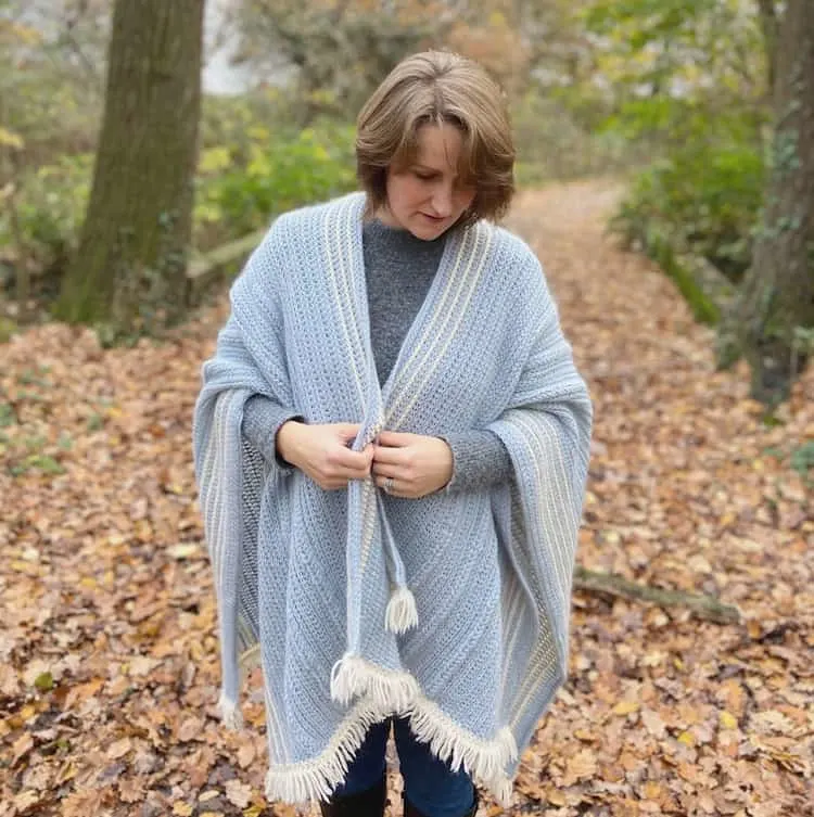 crochet blanket ruana wrap worn by woman in the woods
