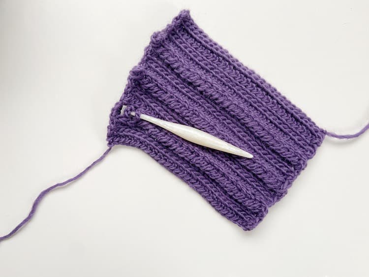 crochet hook an yarn showing crochet braid technique