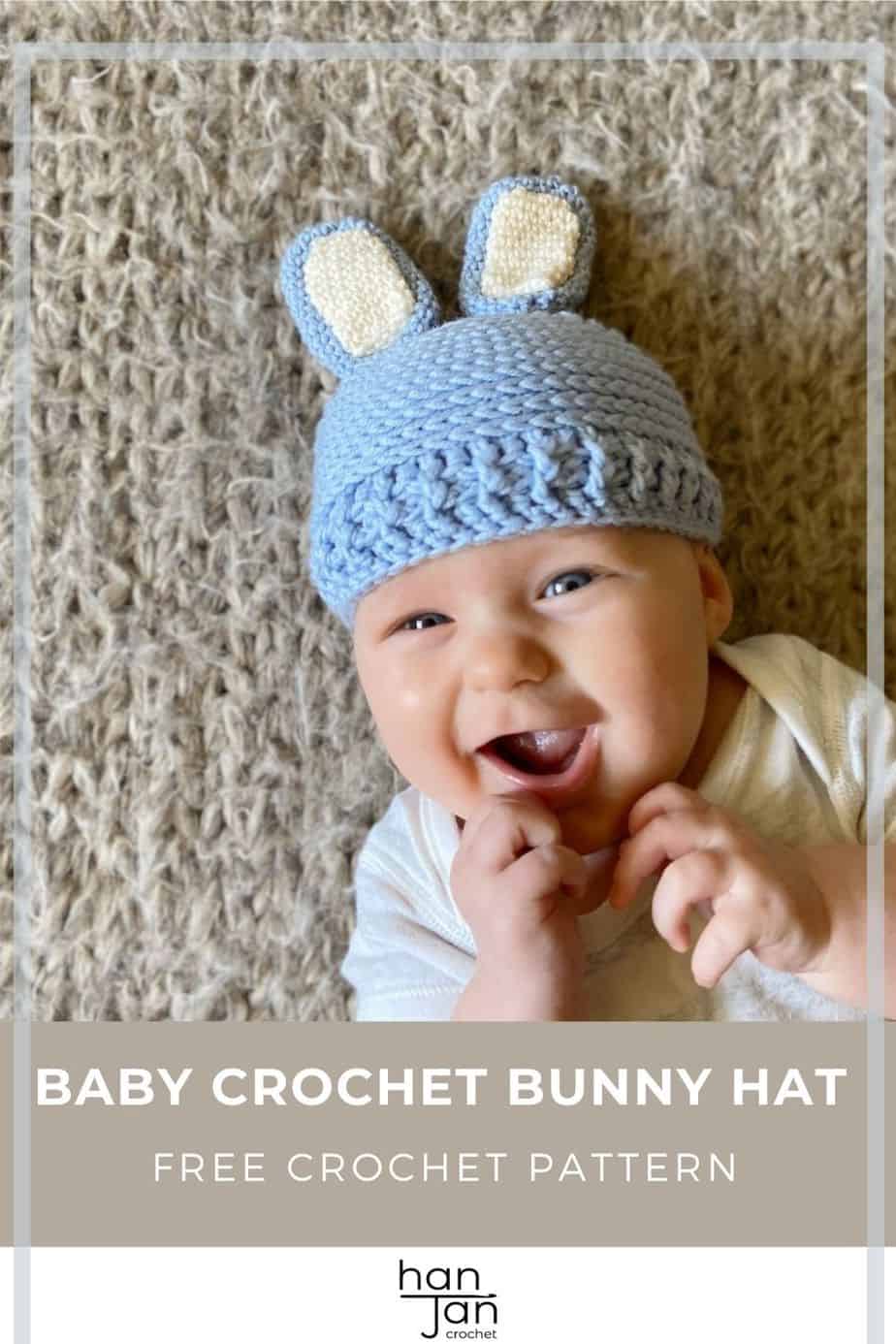baby smiling wearing crochet baby bunny hat patten in blue 
