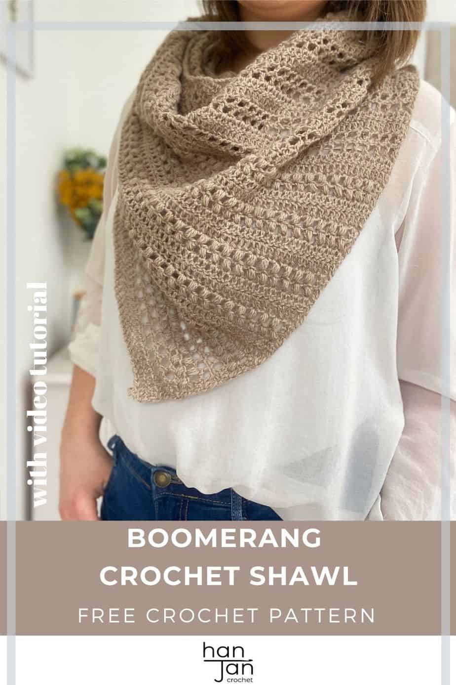 woman wearing white shirt, jeans and textured crochet boomerang shawl with hands in pockets. 