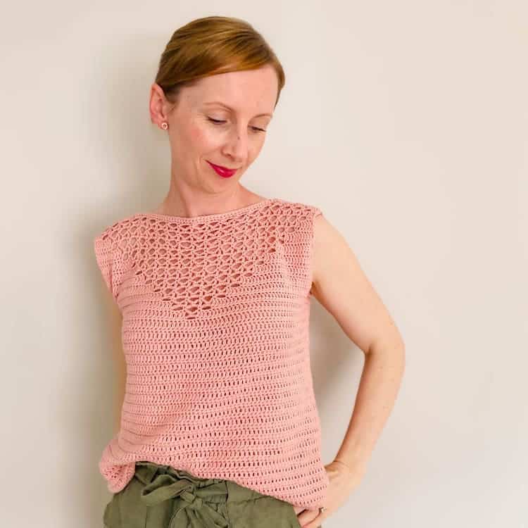 woman wearing light pink lace crochet summer top by Ned and Mimi