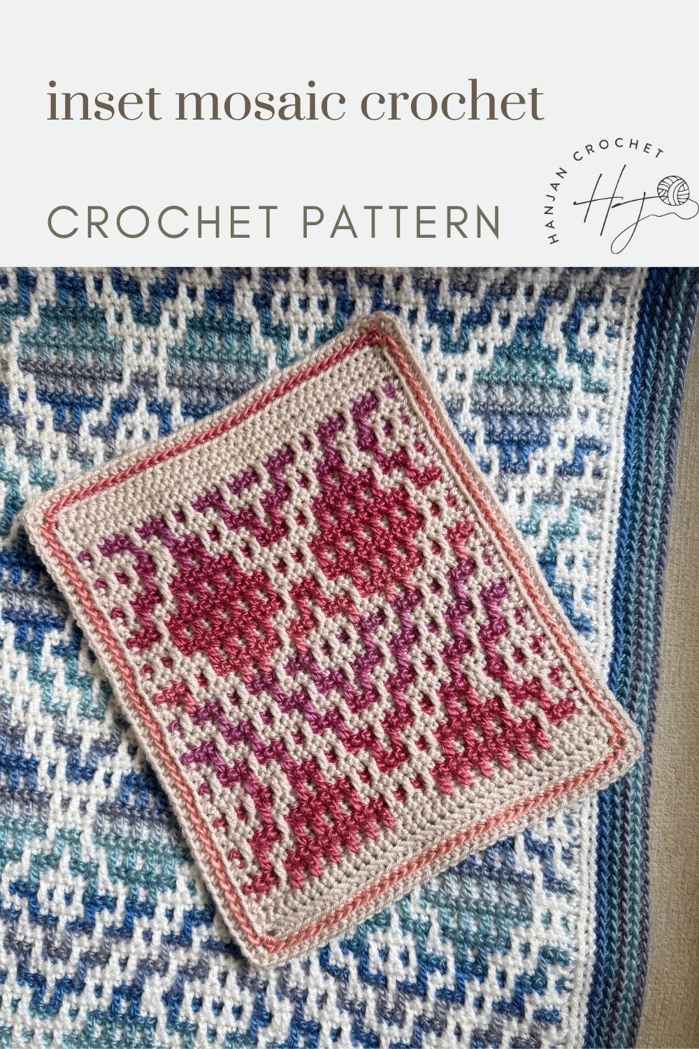 A rectangular crochet swatch with a red and pink mosaic pattern lies on a larger blue and white mosaic crochet blanket, showcasing an inset mosaic crochet design.