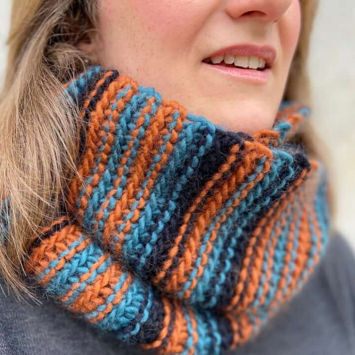 woman wearing striped chunky crochet cowl