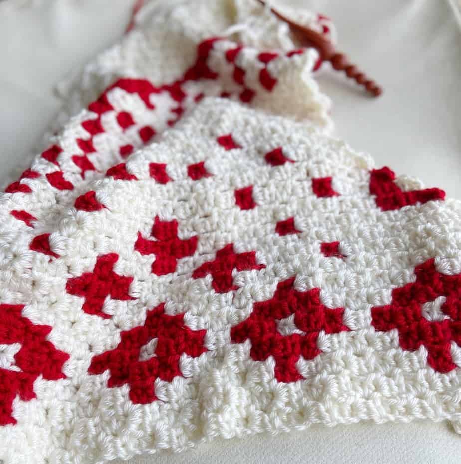close up of c2c crochet pattern of Christmas blanket in progress