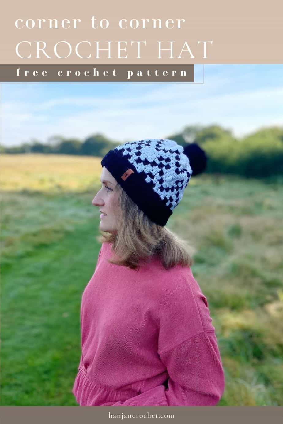 woman wearing black and white crochet hat