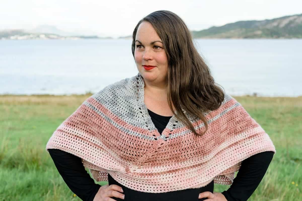 Woman wearing crochet shawl.