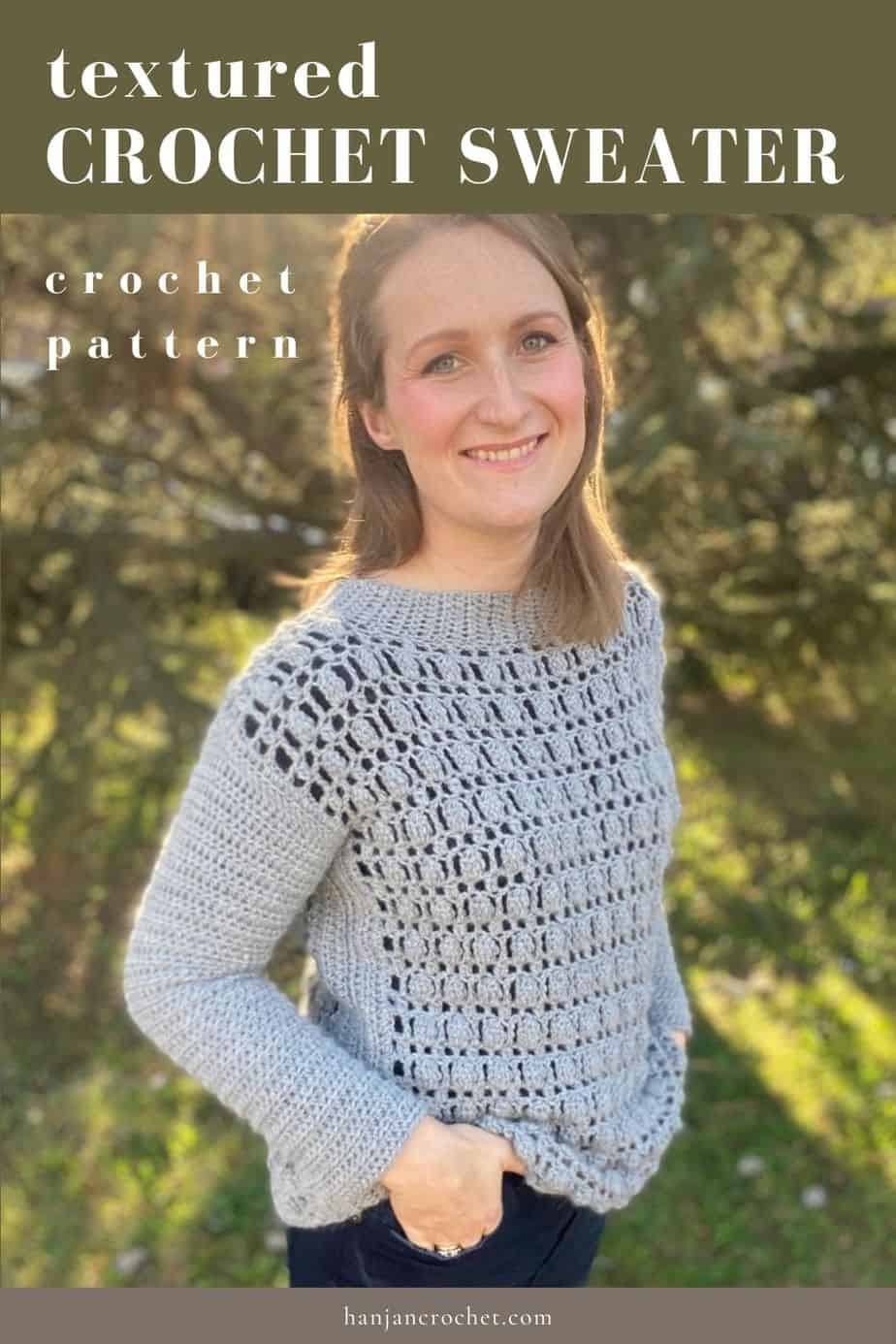 woman wearing grey textured crochet sweater