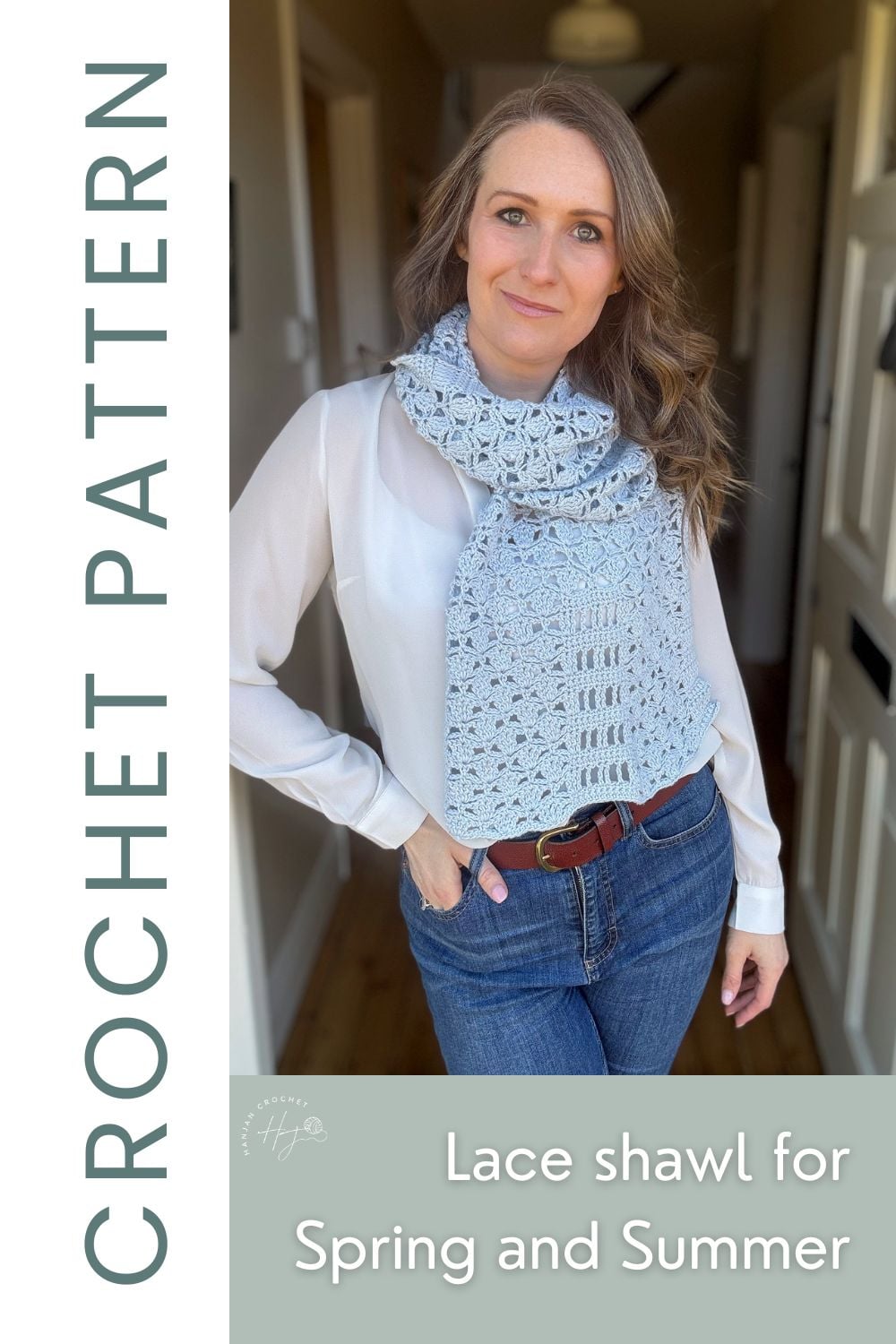 A woman stands indoors wearing a light blue lacy crochet wrap pattern shawl over a white blouse and jeans. Text reads "CROCHET PATTERN" and "Lace shawl for Spring and Summer.