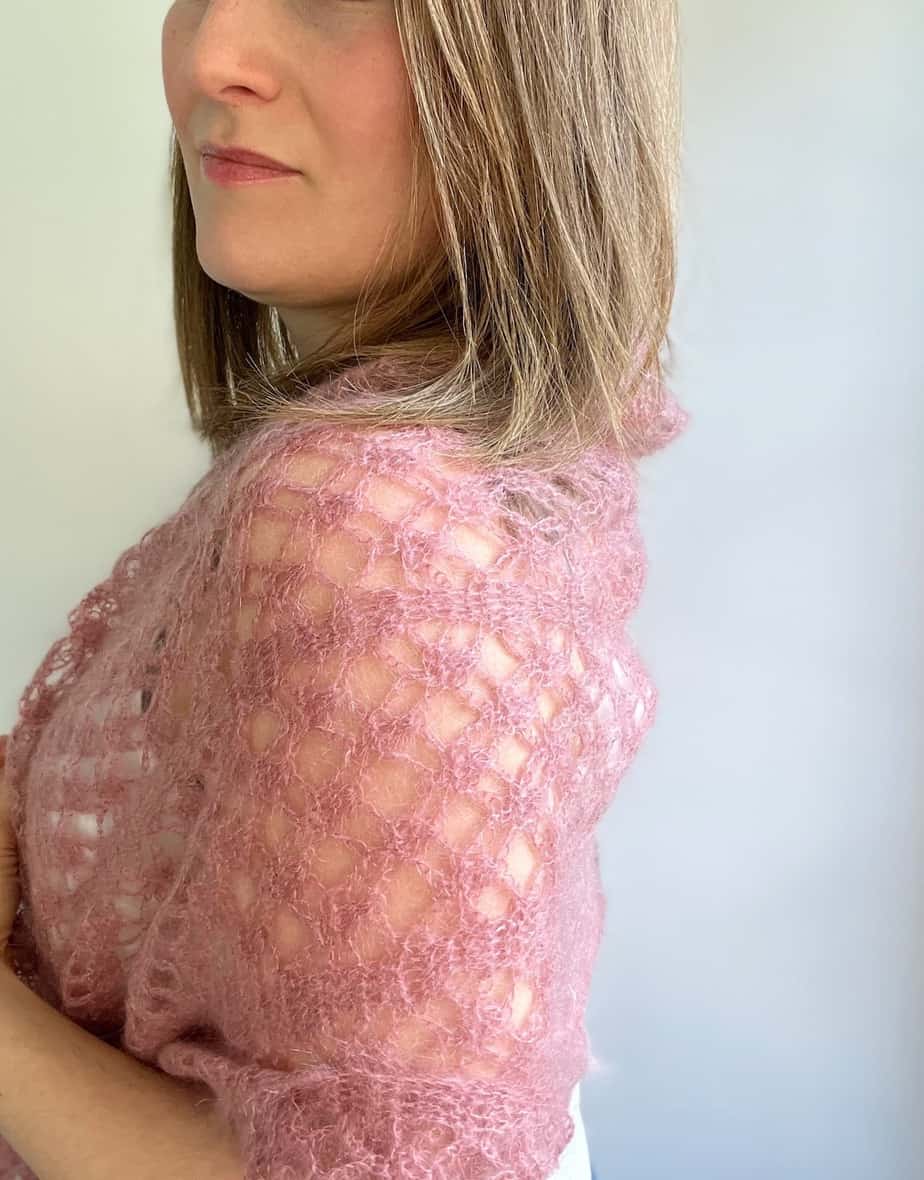 image of back of woman wearing mohair lace crochet scarf
