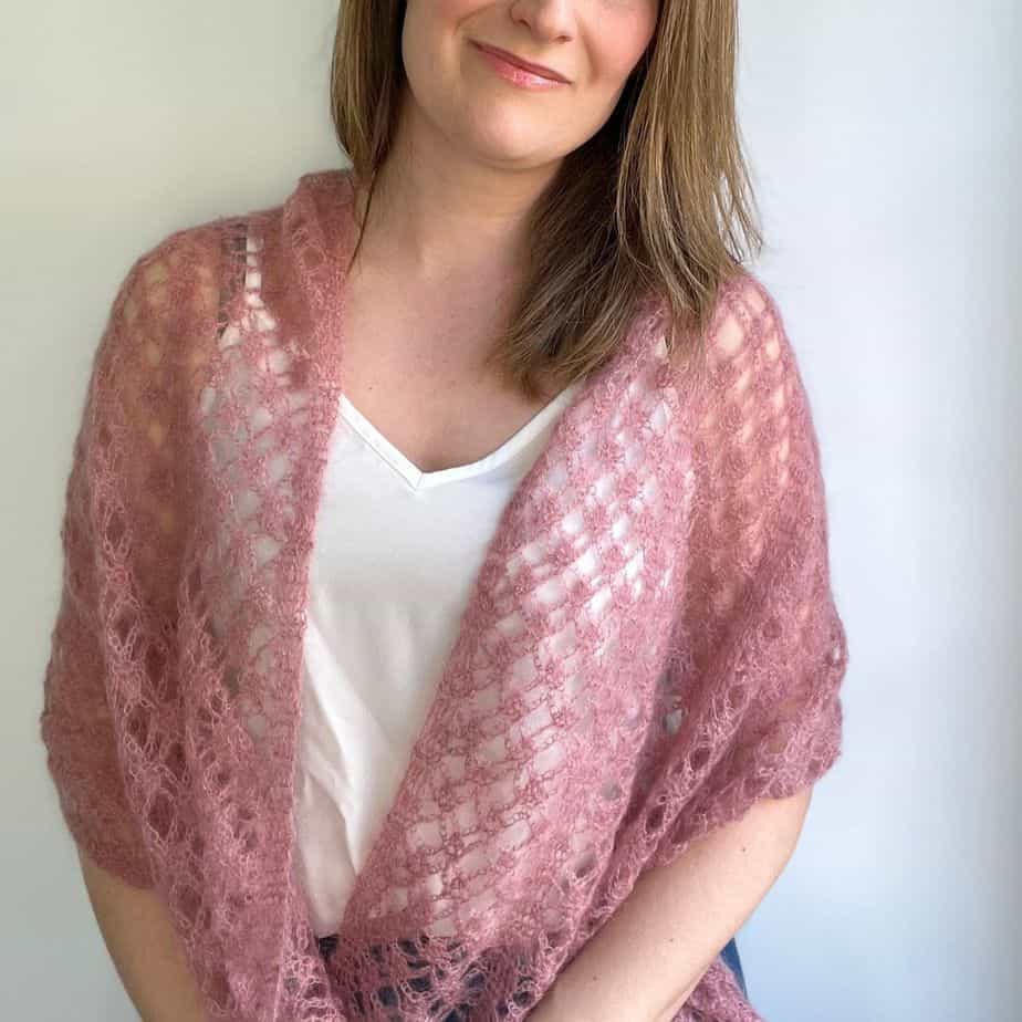 woman wearing pink lace mohair crochet shawl