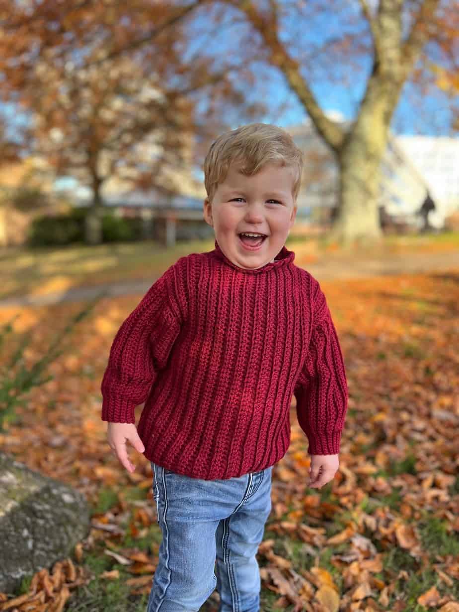 2 year old boy wearing crochet sweater pattern in red