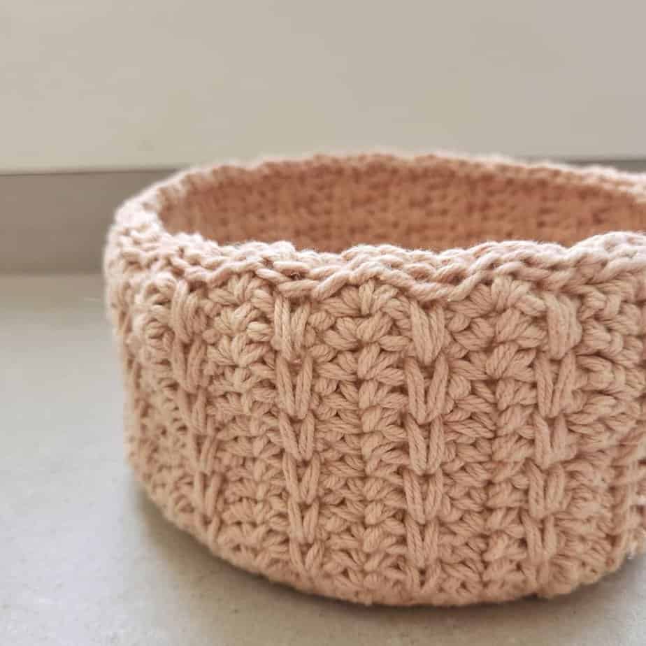 Textured crochet nesting basket pattern in pink.