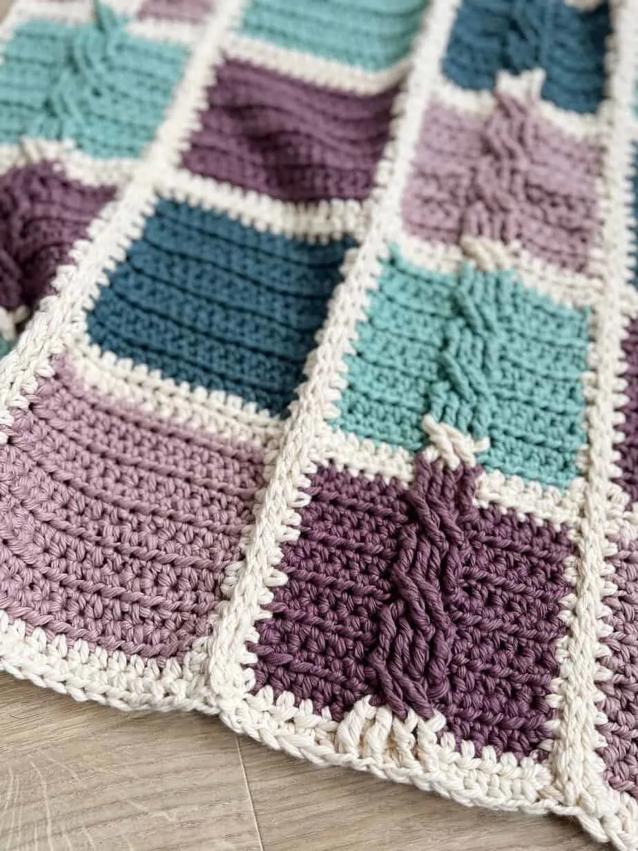 Close up of patchwork crochet pattern edge and border.