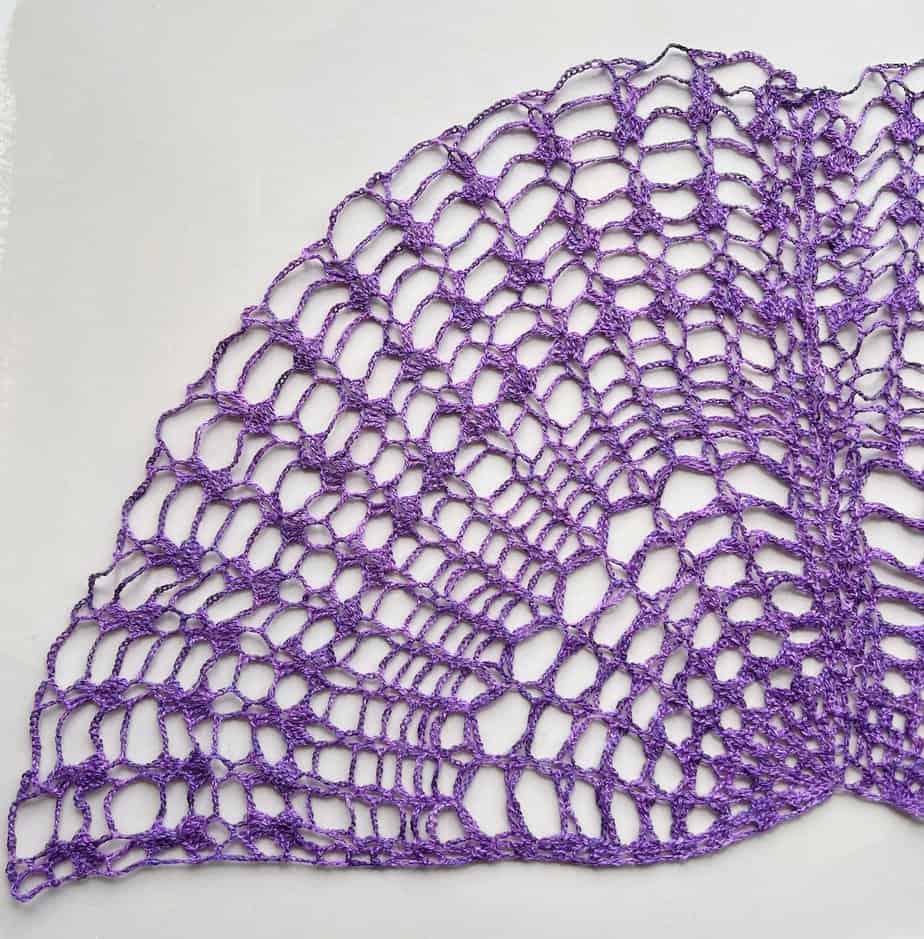 Lace crochet quarter circle to form crochet shawl.