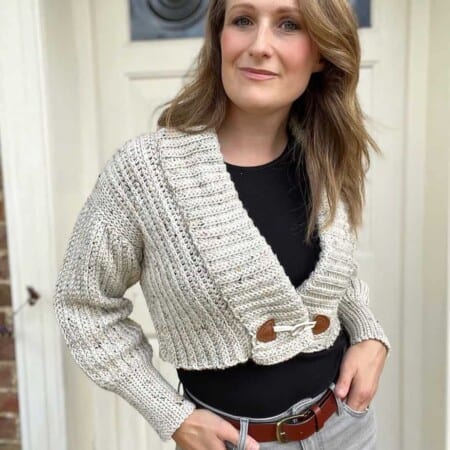 Crop crochet cardigan pattern in tweed yarn.