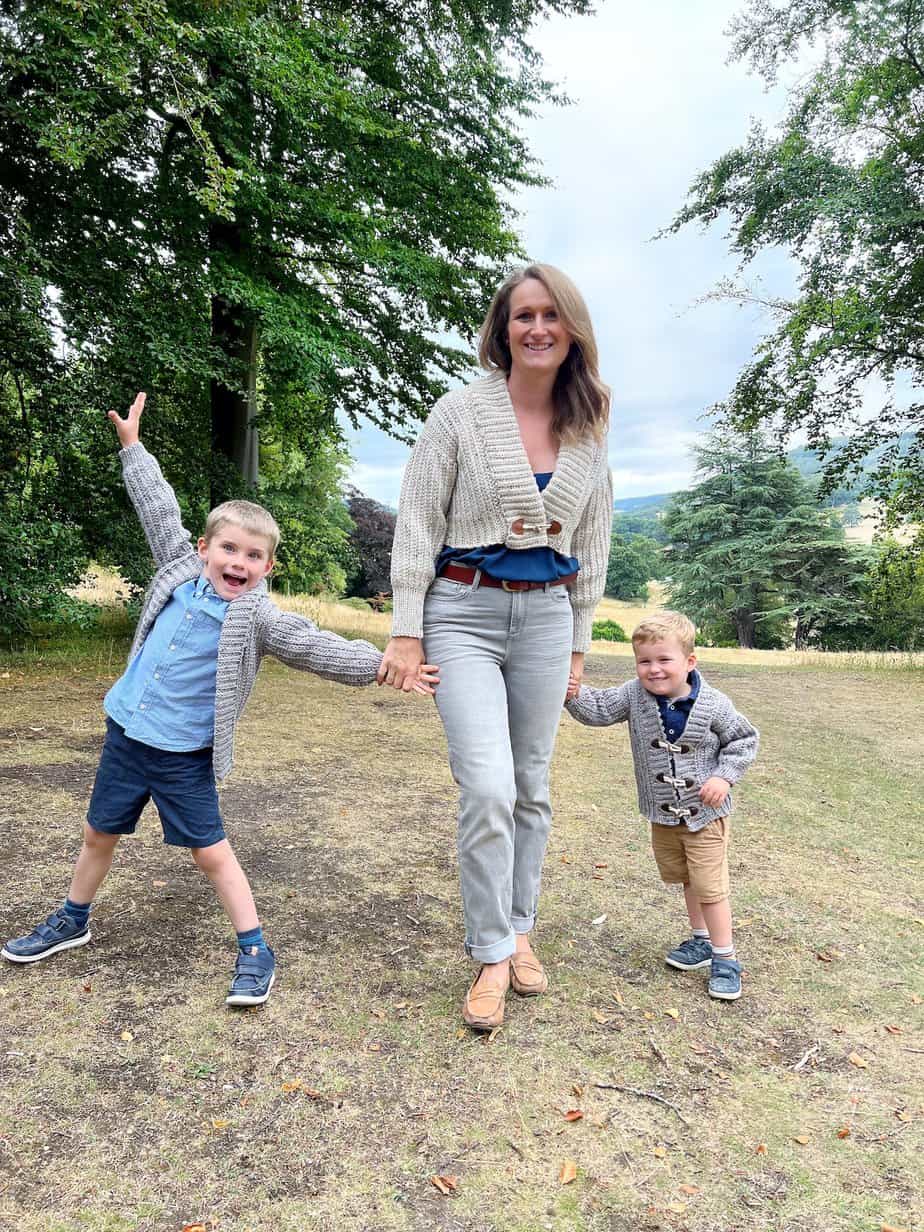 Mother and children wearing matching easy crochet cardigan patterns.