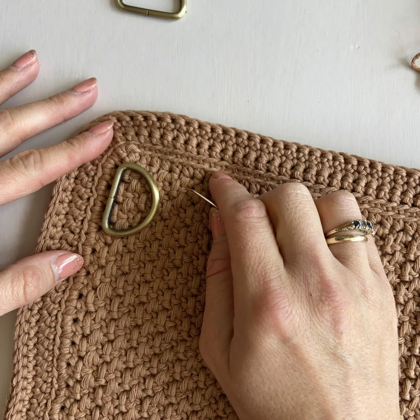 How to attach a clasp onto a crochet backpack.