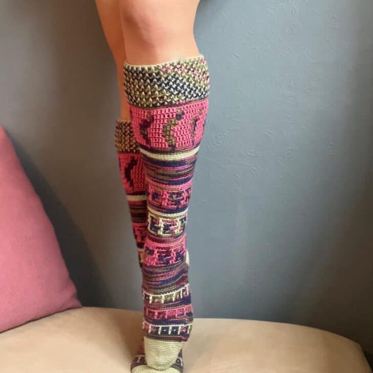 Mosaic crochet sock pattern shown in knee length.