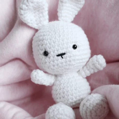 White crochet bunny soft toy.