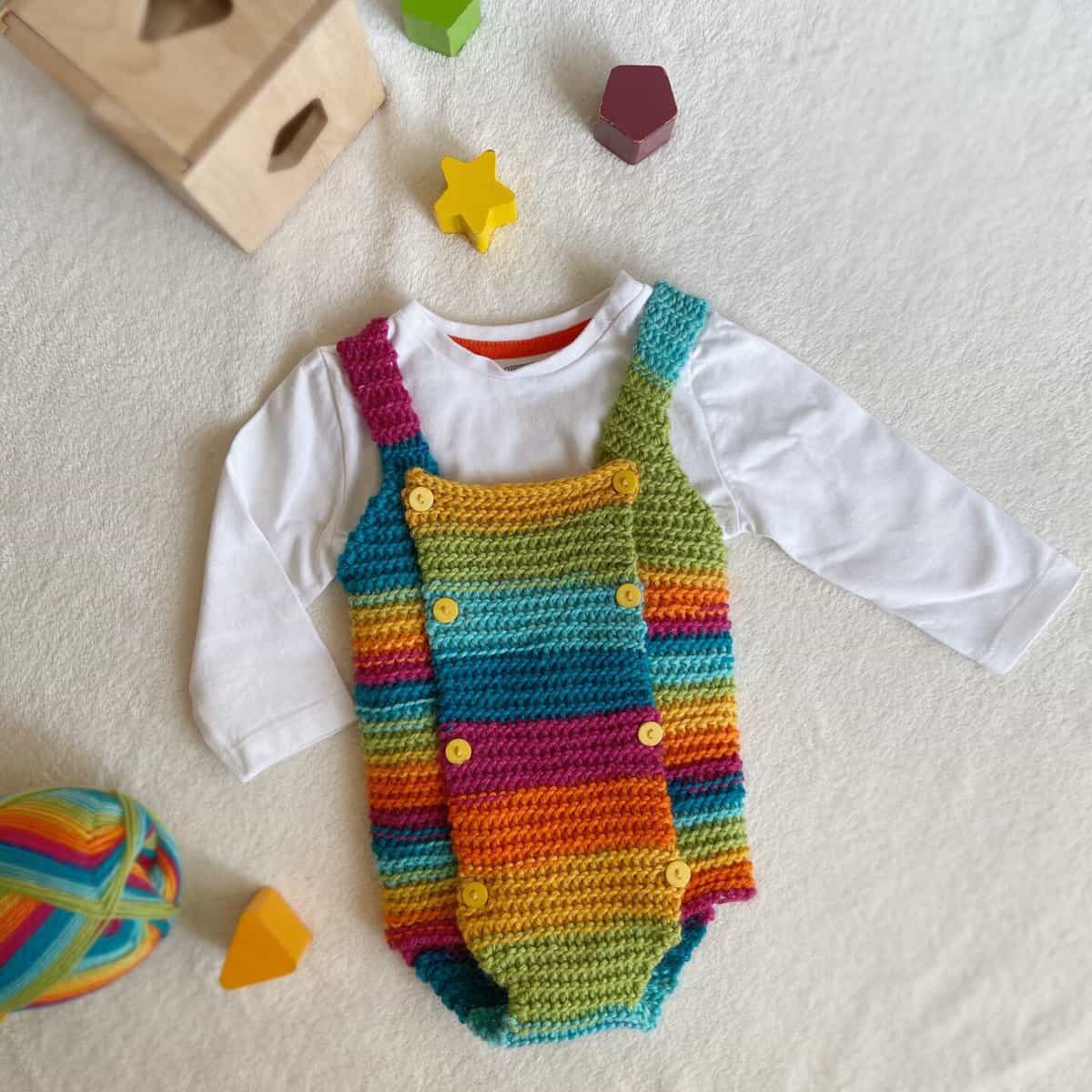 Rainbow baby crochet romper pattern.
