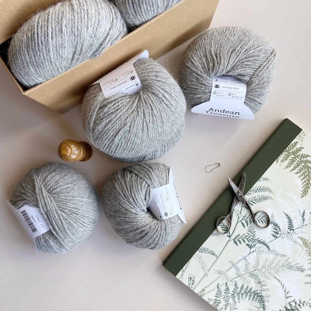 Sport weight yarn in grey for crochet blanket.