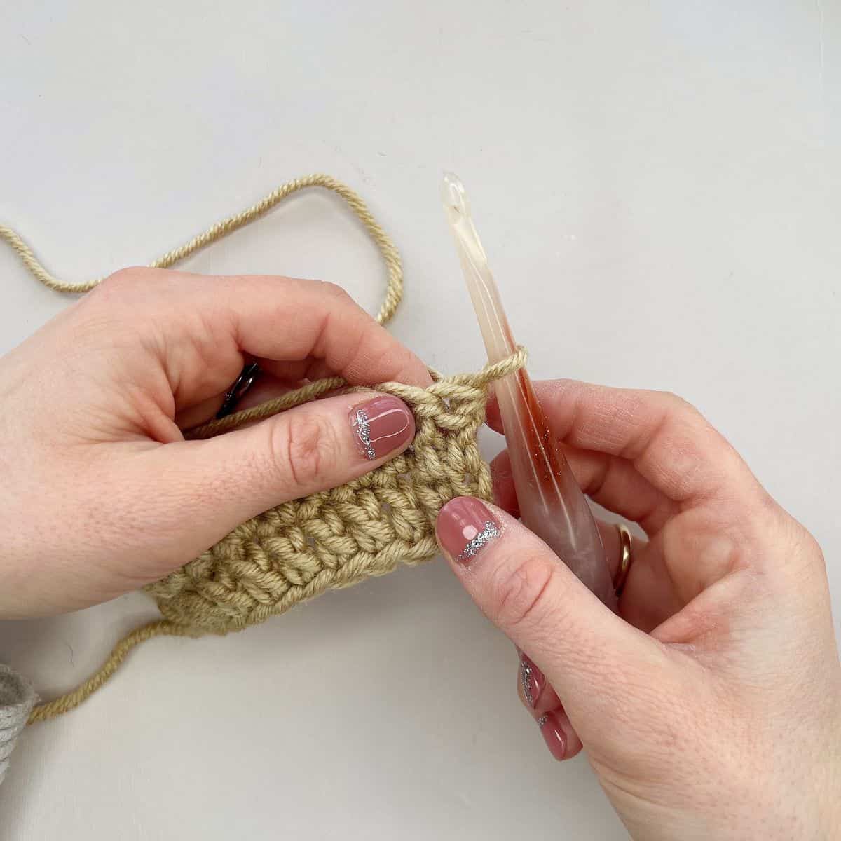 First step of stacked single crochet stitch.