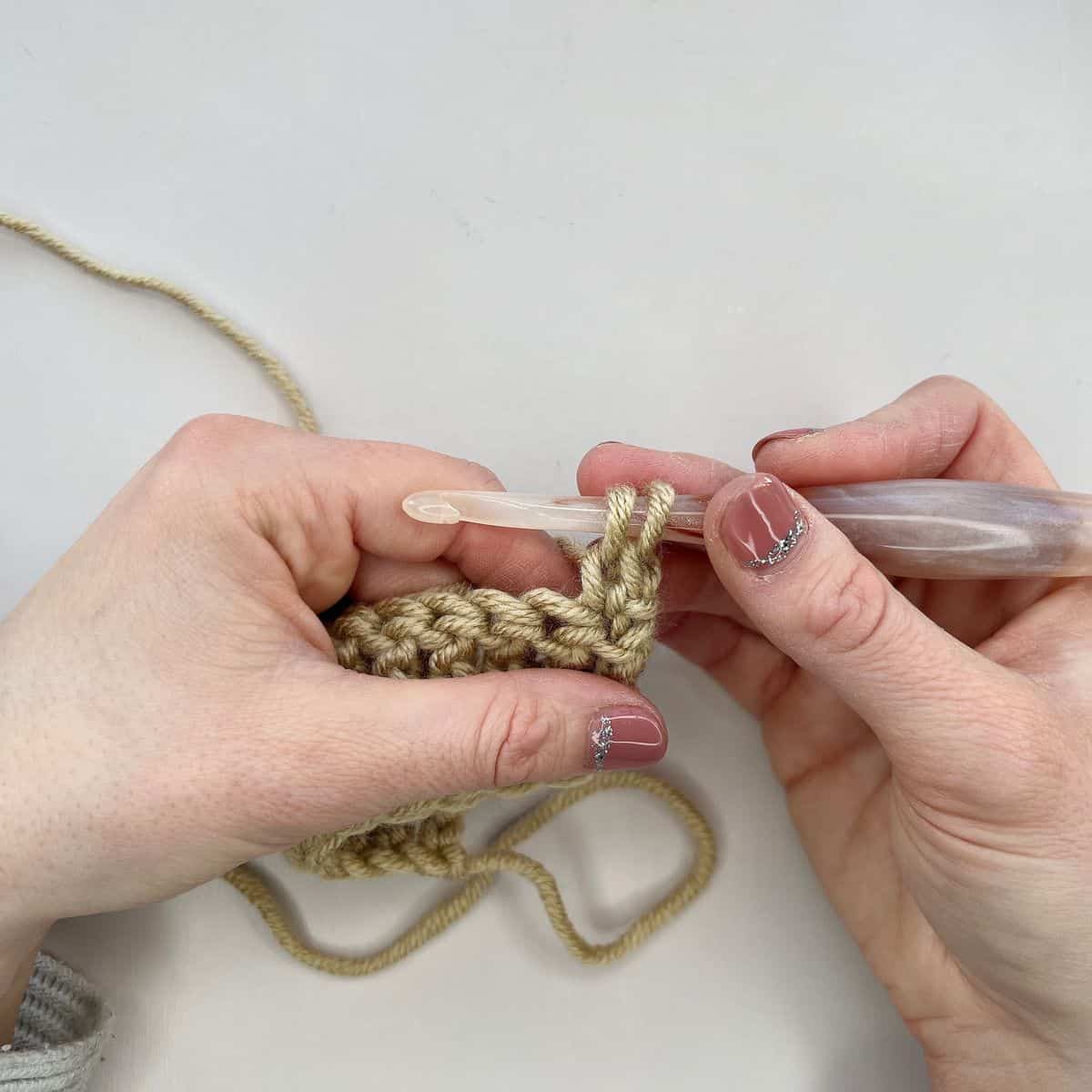 Stacked double crochet stitch about to be completed.