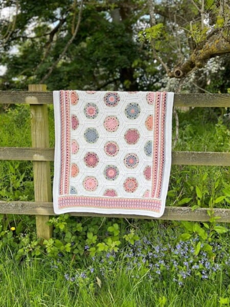 Hexagon crochet blanket pattern in floral colours.