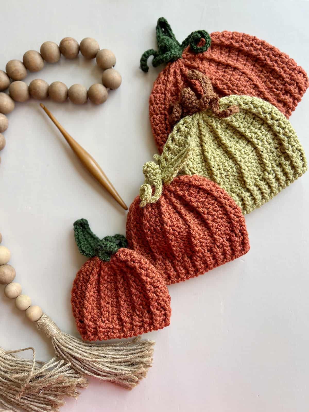 Crochet pumpkin hat pattern for beginners in four sizes from baby to adult.