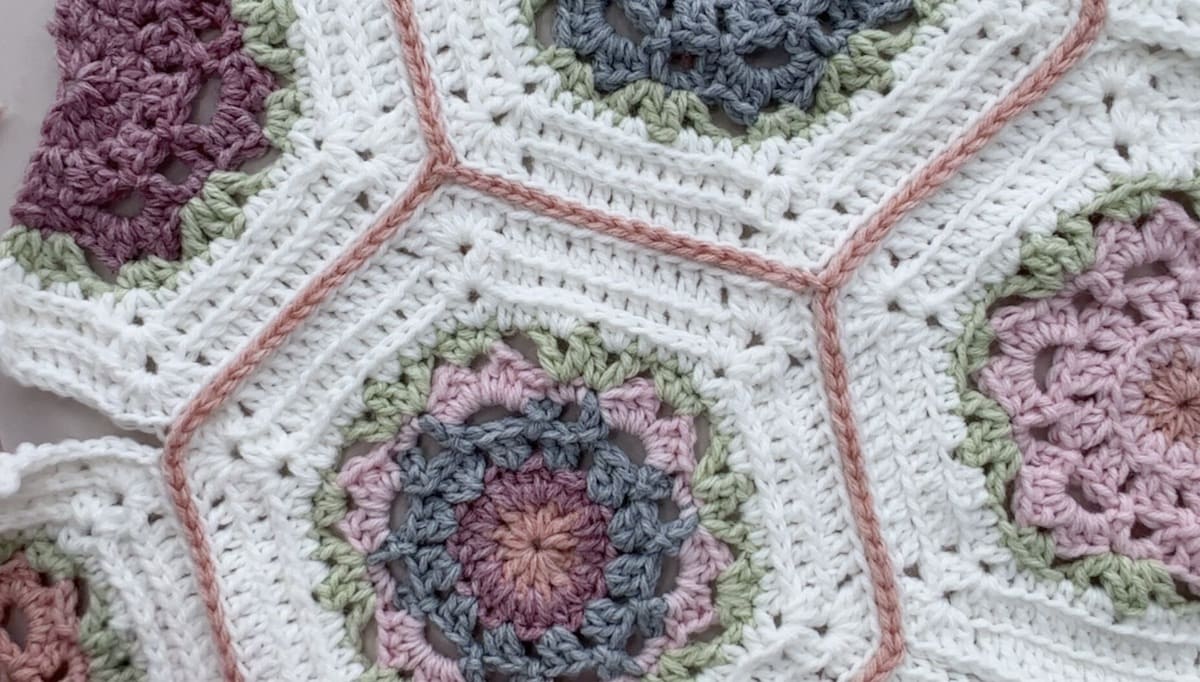 Crochet hexagons joined together to make a blanket.