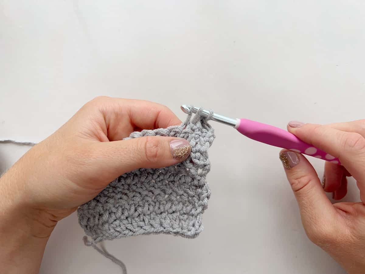 Herringbone dc stitch tutorial step 4: pull loop through the stitch