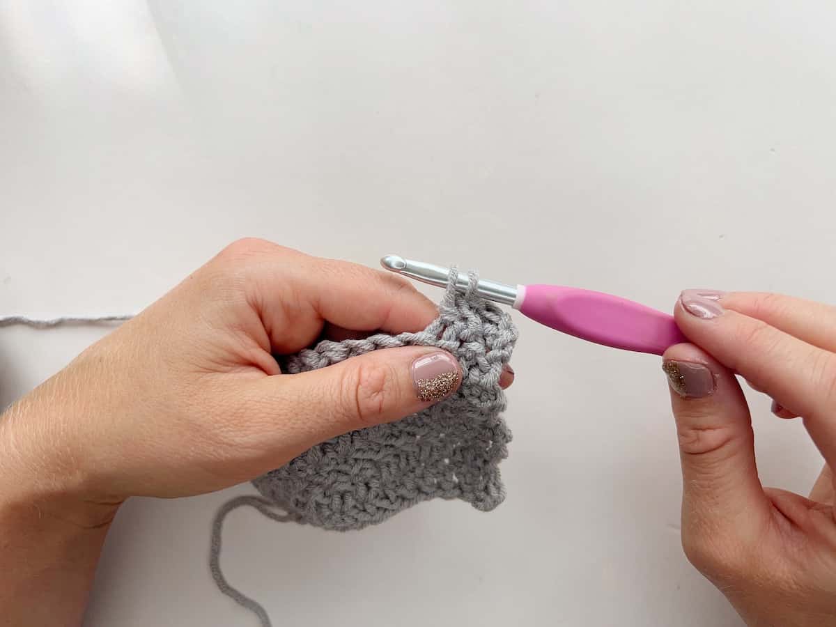 Herringbone double crochet stitch step 5 - pull straight through the next loop on the hook