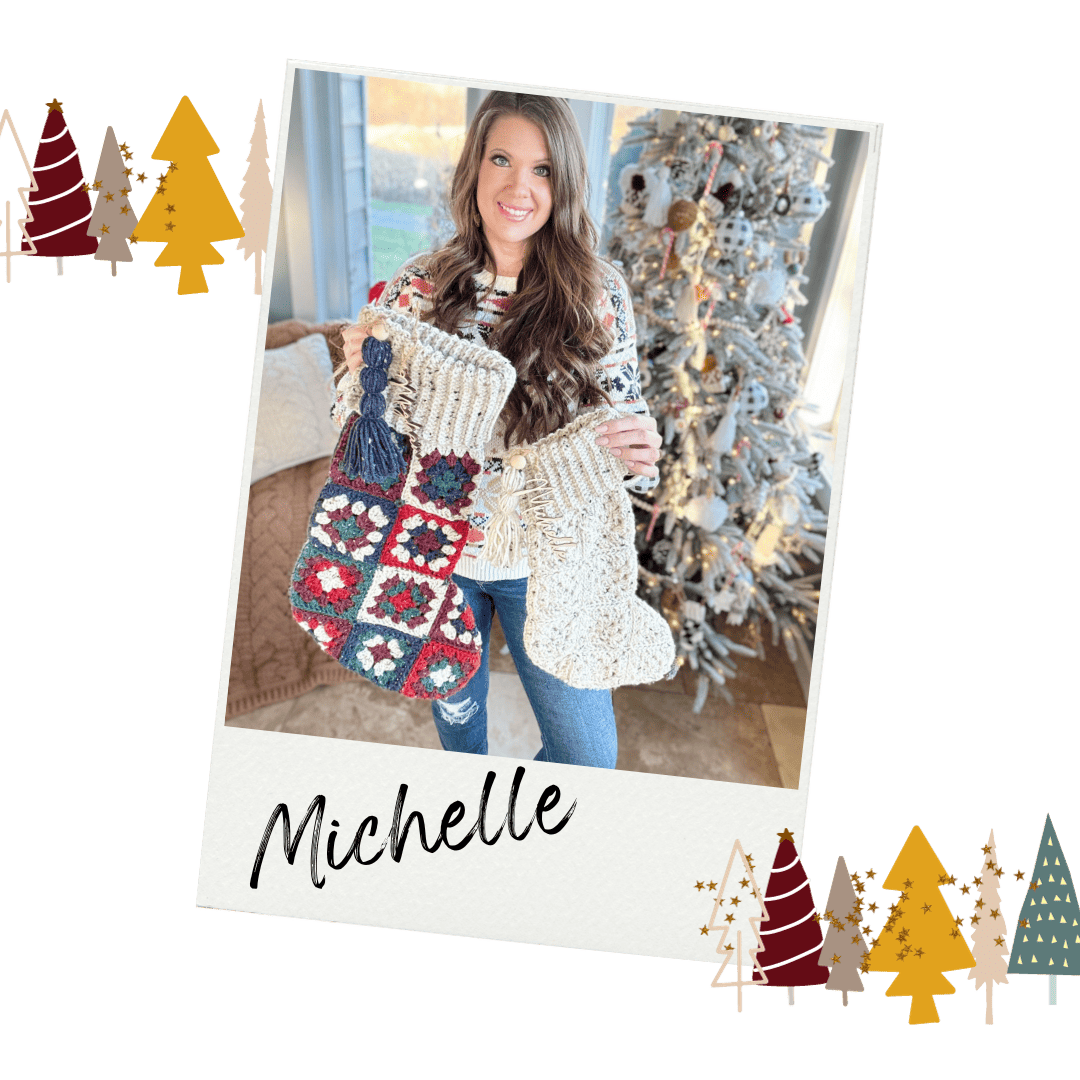 A woman holding a stocking with the word michelle on it.
