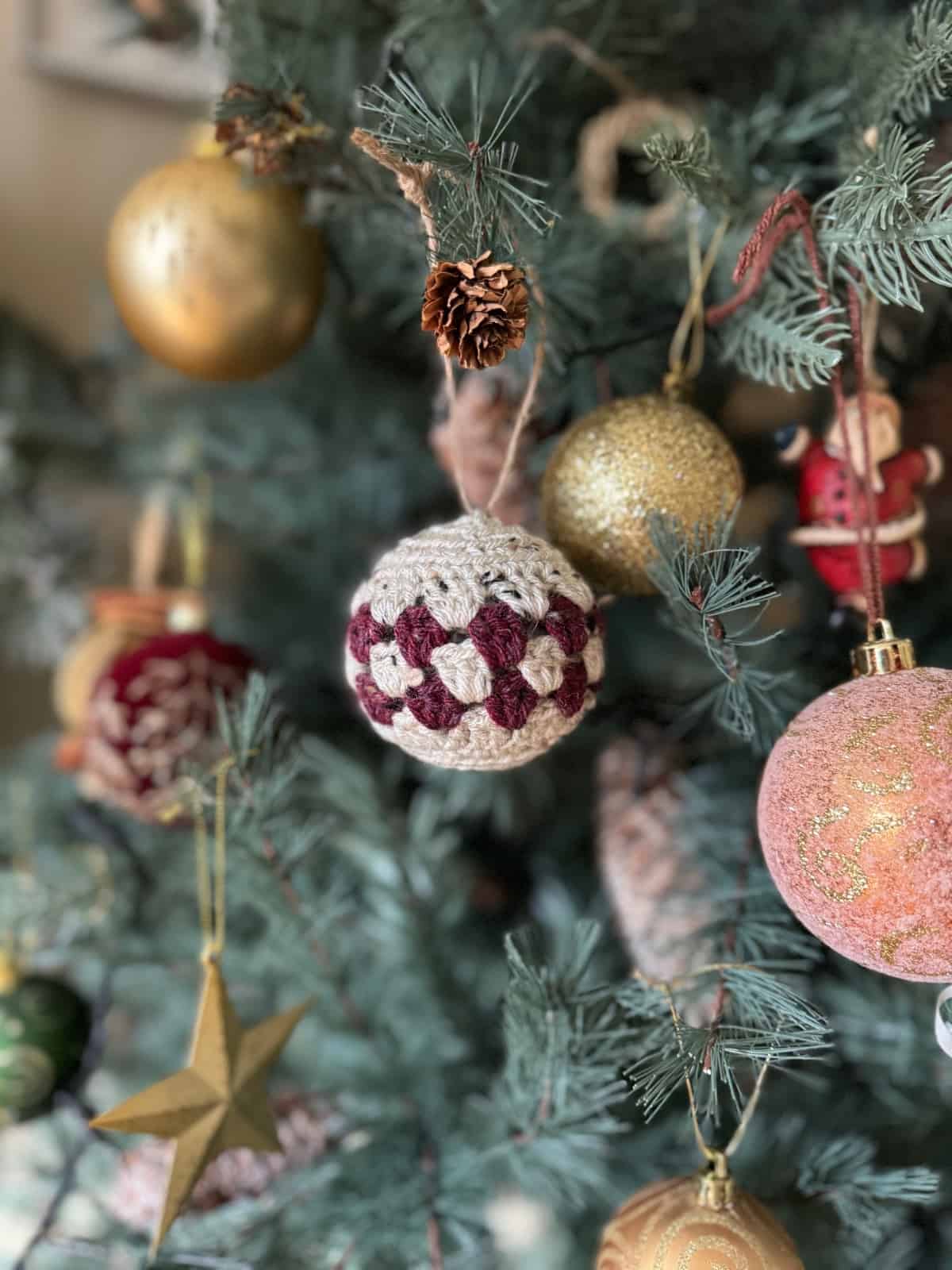 Christmas ornaments hanging on a christmas tree.