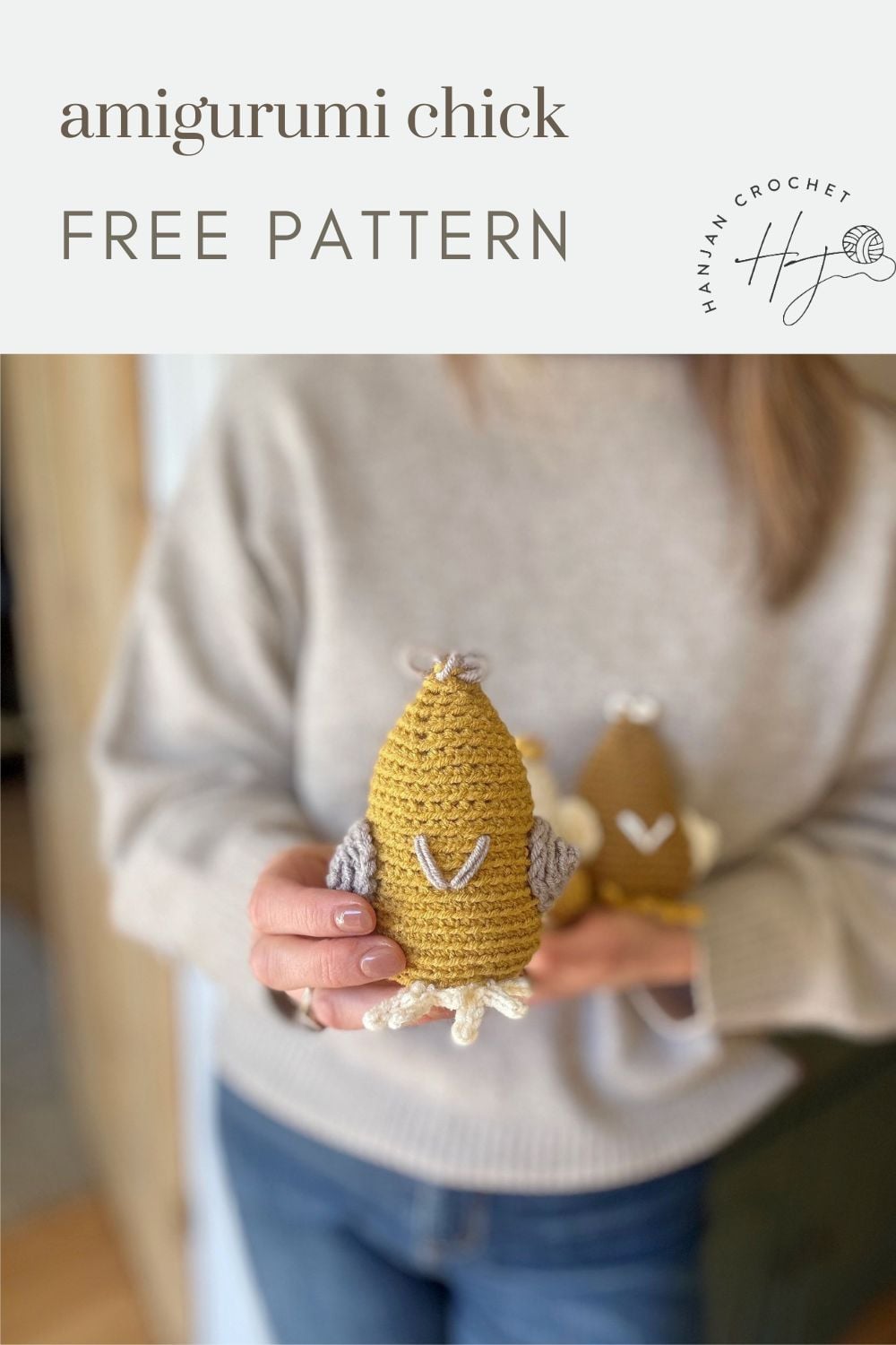 Person holding a crocheted yellow chick with white and gray details; text reads "amigurumi chick FREE PATTERN" with a crochet chicken pattern logo in the corner.
