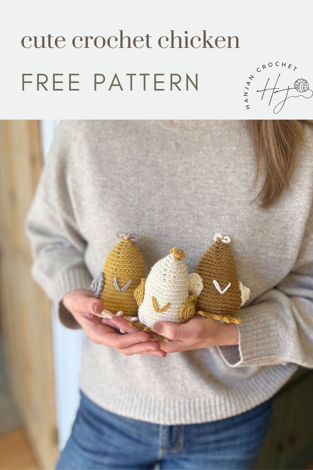 A person in a grey sweater holds three crocheted chicken figures in brown, cream, and yellow. Text above reads "cute crochet chicken FREE PATTERN"—perfect if you're looking for a fun crochet chicken pattern!.